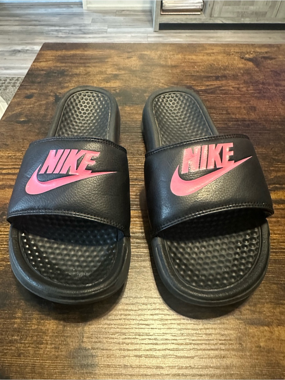 Nike womens Black Slides with Pink Logo Swoosh